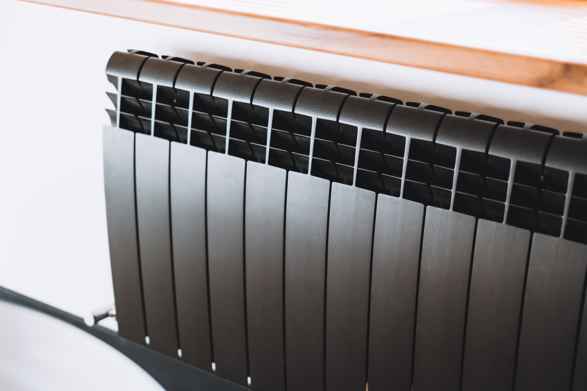 Black aluminum alloy metal heating radiator for home.
